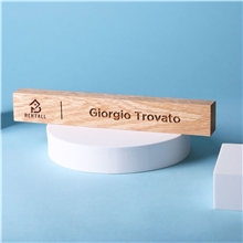 a group of oak wood executive name bar with custom engraving