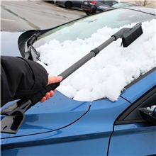 a group of icicle extendable ice scraper / snow brush