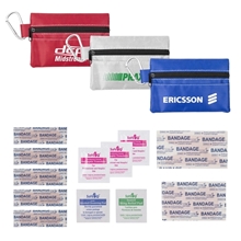 aerial view a group of 14pc first aid kit in soft zipper pouch with carabiner, image 1 of 2