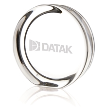 aerial view a clear round paperweight with flat edge, image 1 of 2