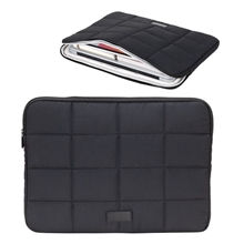 aerial view a black vallum quilted sleeve for 15 laptops, image 1 of 3