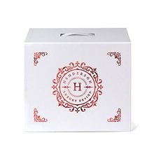 aerial view a white shelly magnetic closure handle box, image 1 of 10
