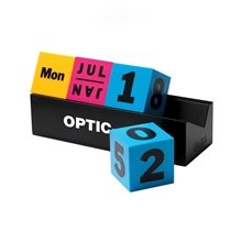 a yellow/pink/blue moma cubes perpetual calendar red / blue / yellow month date day