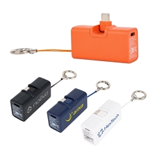 aerial view a group of bijou 1200mah ul listed power bank with usb - c tip keyring, image 1 of 4