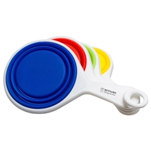 aerial view a white/multicolor cups pop out silicone measuring cups, image 1 of 3