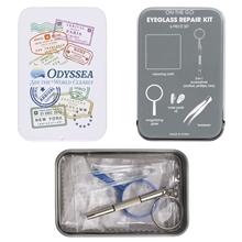 aerial view a assorted color accessories in a gray and white tin on the go eyeglass repair kit, image 1 of 2