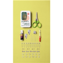 a group of on the go mini sewing kit