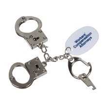 a silver metal plastic mini handcuff key chain