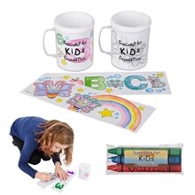 a white interactive coloring mug with crayons set