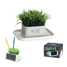 a white kikkerland potted pen phone stand