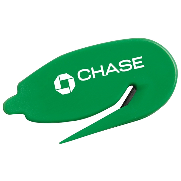 aerial view a green plastic letter opener staple remover, image 2 of 2