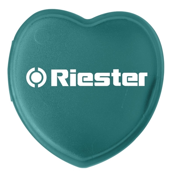 aerial view a translucent aqua heart shaped pill box, image 2 of 2