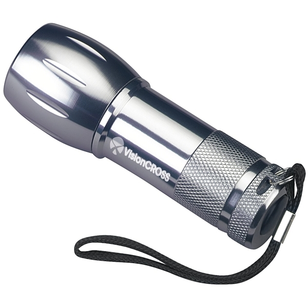 aerial view a silver mini aluminum led flashlight, image 2 of 3