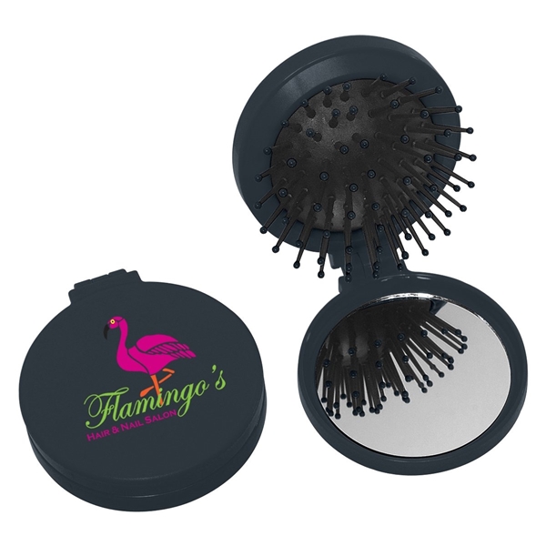 aerial view a black brush and mirror compact 2- in -1 mini travel kit, image 3 of 3