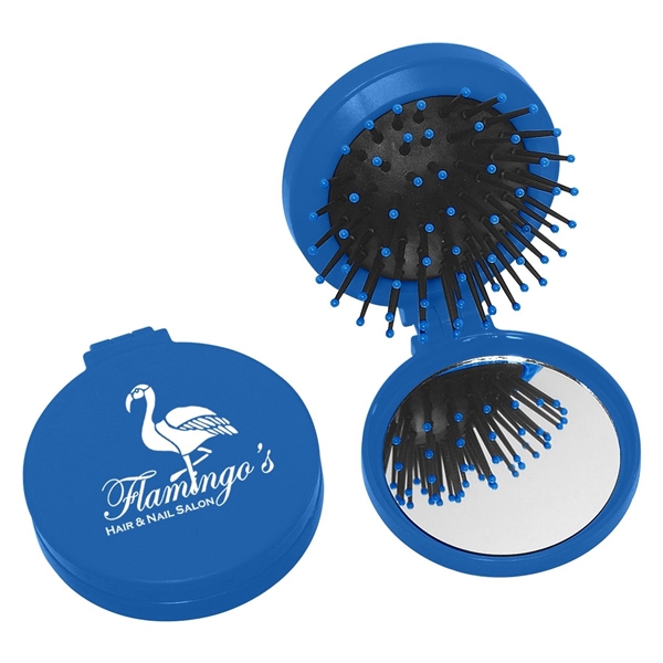 aerial view a blue brush and mirror compact 2- in -1 mini travel kit, image 2 of 3