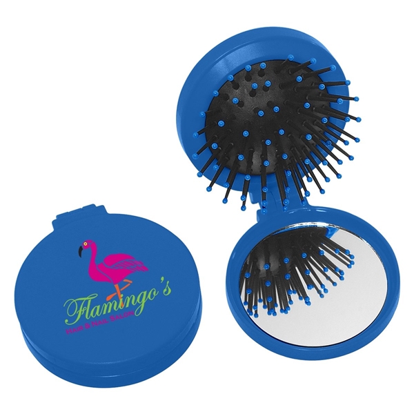 aerial view a blue brush and mirror compact 2- in -1 mini travel kit, image 3 of 3