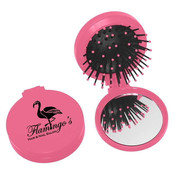aerial view a pink brush and mirror compact 2- in -1 mini travel kit, image 2 of 3
