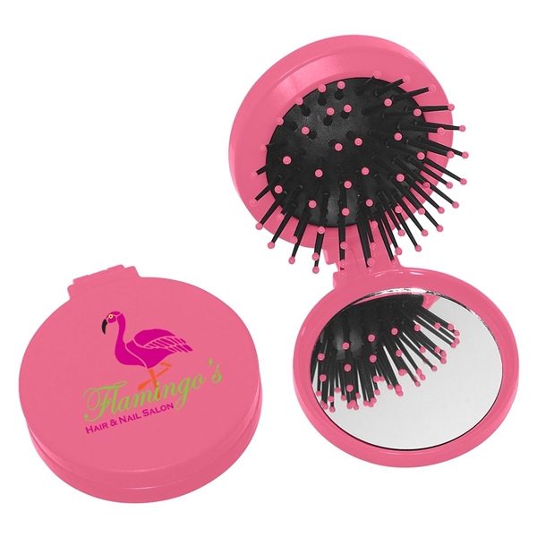 aerial view a pink brush and mirror compact 2- in -1 mini travel kit, image 3 of 3