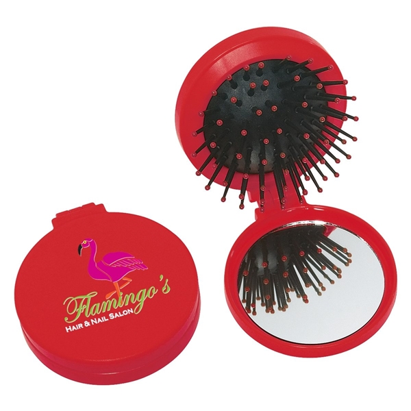aerial view a red brush and mirror compact 2- in -1 mini travel kit, image 3 of 3
