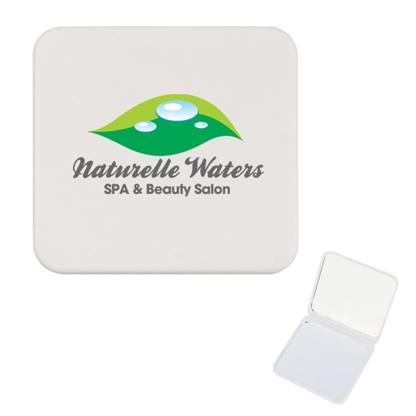 aerial view a solid white compact mirror with dual magnification, image 3 of 4