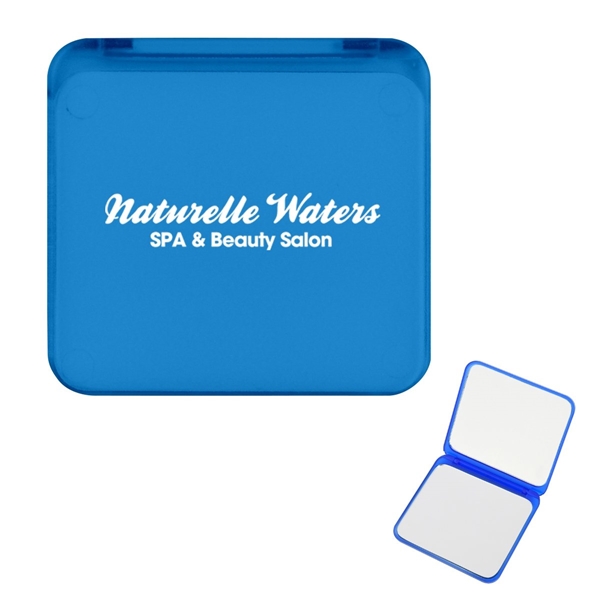 aerial view a translucent blue compact mirror with dual magnification, image 2 of 4