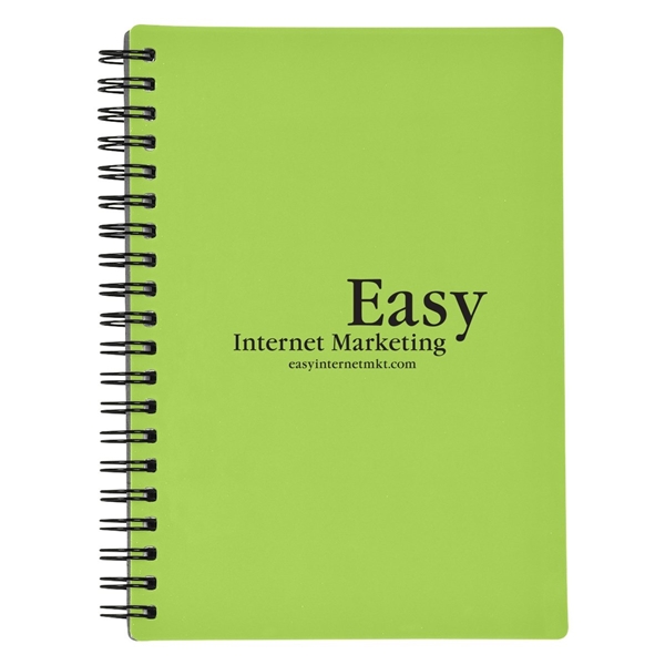 aerial view a lime green rubbery spiral memo notebook, image 2 of 2