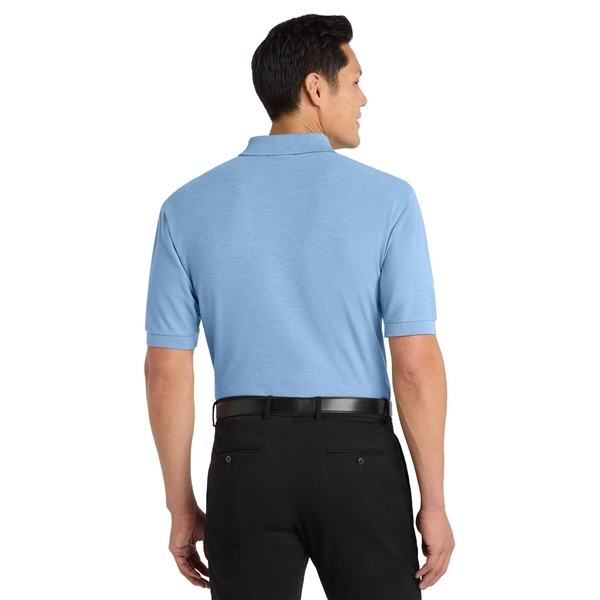 aerial view a light blue port authority silk touch polo shirt, image 4 of 5