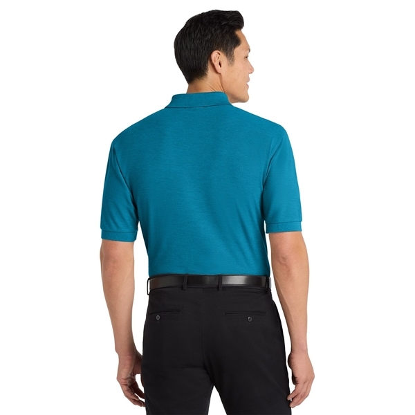 aerial view a turquoise port authority silk touch polo shirt, image 4 of 5
