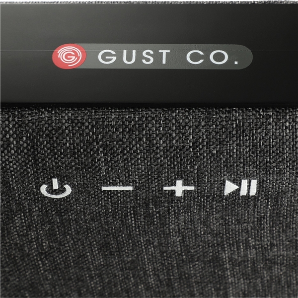 aerial view a black woven fabric bluetooth speaker, image 9 of 9