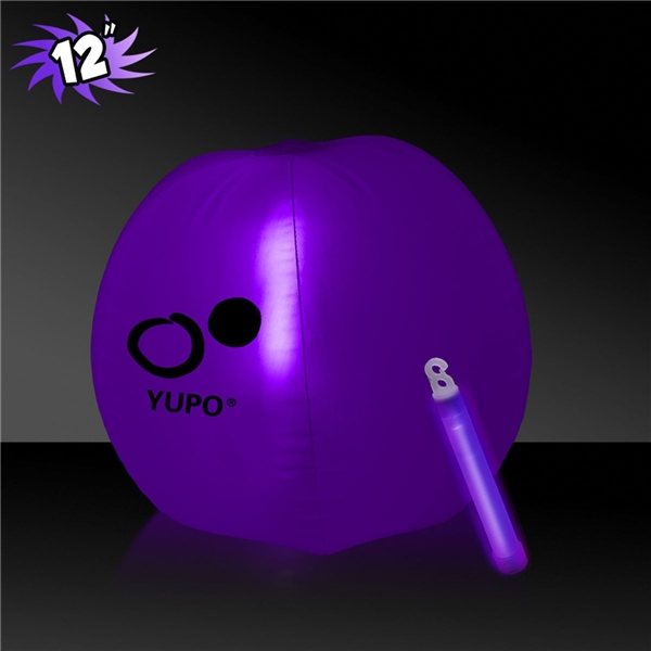 aerial view a purple 12 inch inflatable beach balls with 1 - 6 inch purple glow stick, image 2 of 3