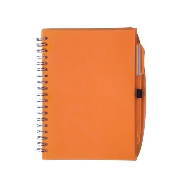 aerial view a translucent orange spiral notebook with pen, image 2 of 2