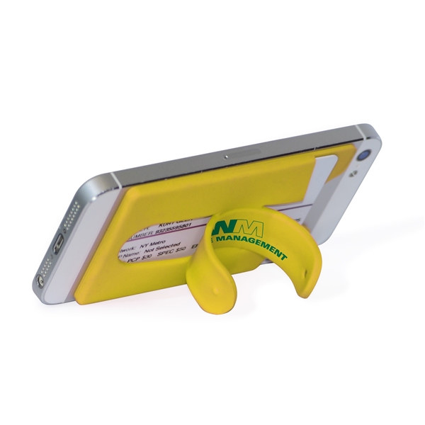 aerial view a yellow silicone stand smart wallet phone stand, image 3 of 3