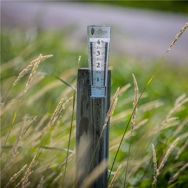 aerial view a clear-white 4 magnifying rain gauge, image 3 of 4