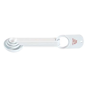 aerial view a white set of four measuring spoons, image 1 of 4